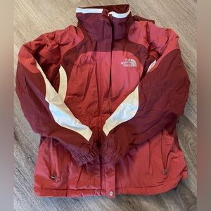 Red and gray north face ski jacket coat